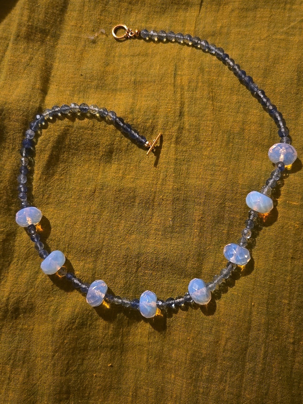Handcrafted Blue Beaded Necklace with Opalescent Accents